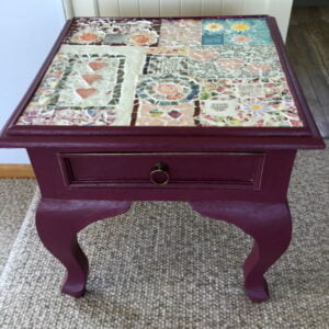 Kate's Mosaic table using flower heart inserts from MosaicInspiration.com